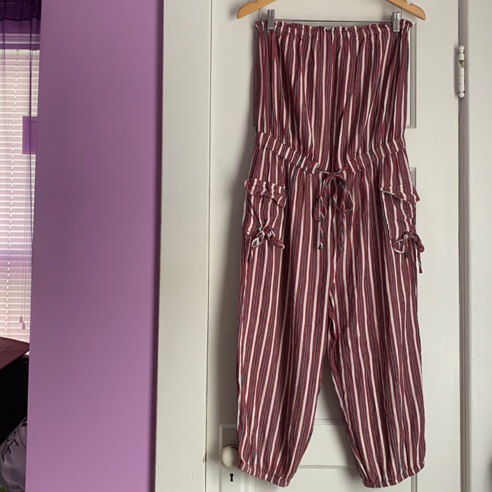 We have a Size Large Romper. Only worn once. No tags